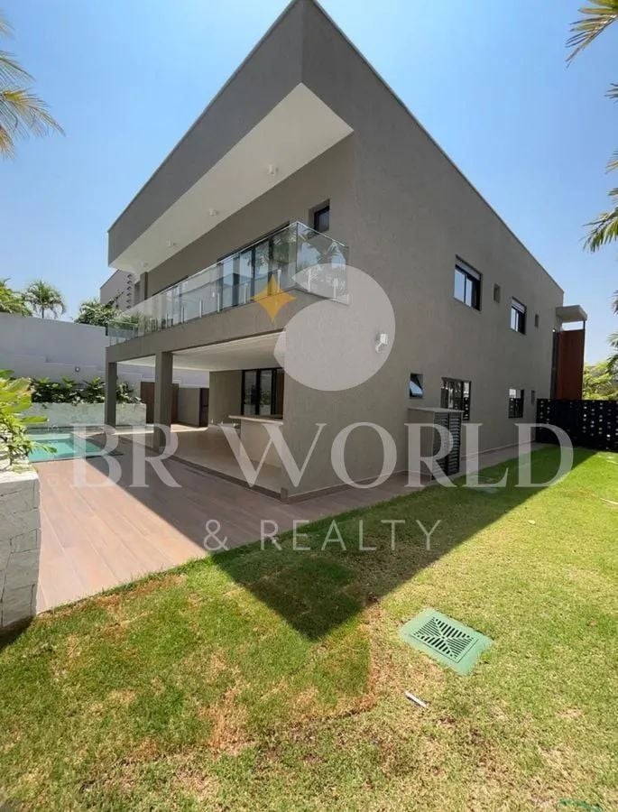 Sobrado com 4 suítes rico em armários e área de lazer, Alphaville Araguaia